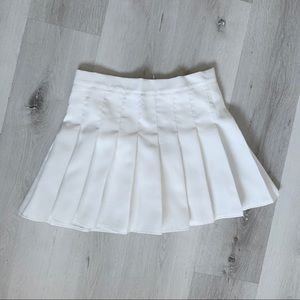White pleaded skirt